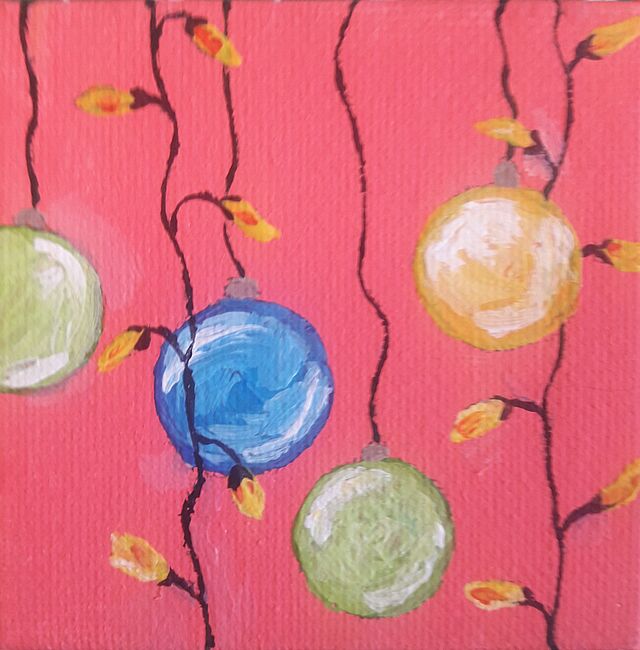 Bunte Weihnachtskugel auf rosa Hintergrund gemalt.