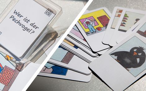 Kartenspiel mit Pechvogelbild in Plastikbox